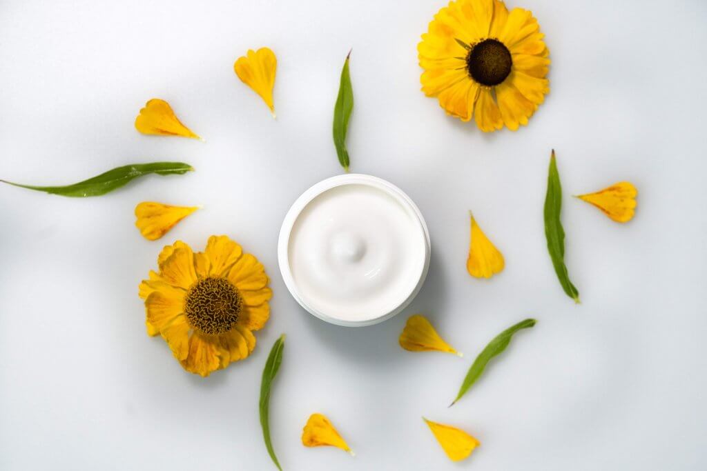 Photograph of cream and flowers