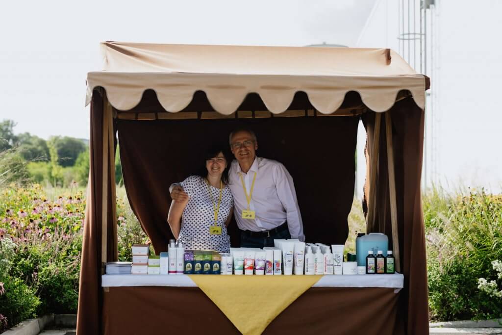 Photograph of employees in a booth